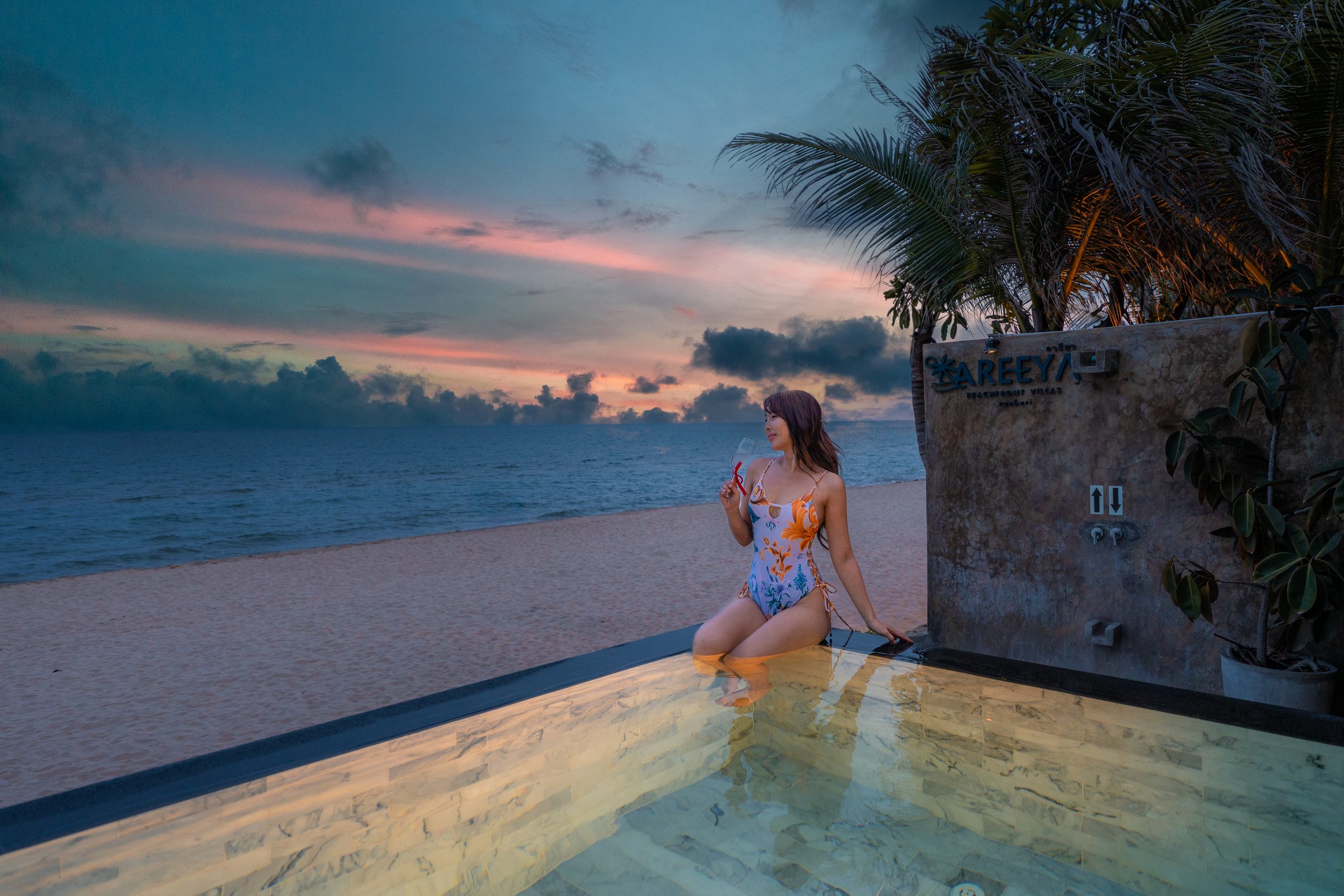 Beachfront pool at sunset